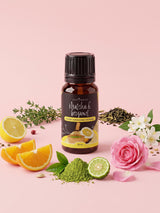 Olejek zapachowy do świec Matcha and Bergamot w butelce 10 ml otoczonej matchą, bergamotką, liśćmi herbaty, cytryną, pomarańczą i różą