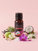 Olejek zapachowy do świec Sól Morska i Orchidea w butelce 10 ml otoczonej fioletową orchideą, kryształkami soli morskiej, zielonym jabłkiem, kokosem, jaśminem i konwalią