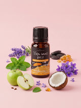 Olejek zapachowy do świec Warm Summer Breeze w butelce 10 ml otoczonej lawendą, miętą, zielonym jabłkiem, kokosem, fiołkami i bursztynem